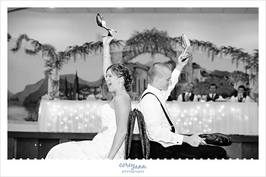 Kathleen and Derek's Canton Wedding bride and groom playing the shoe game