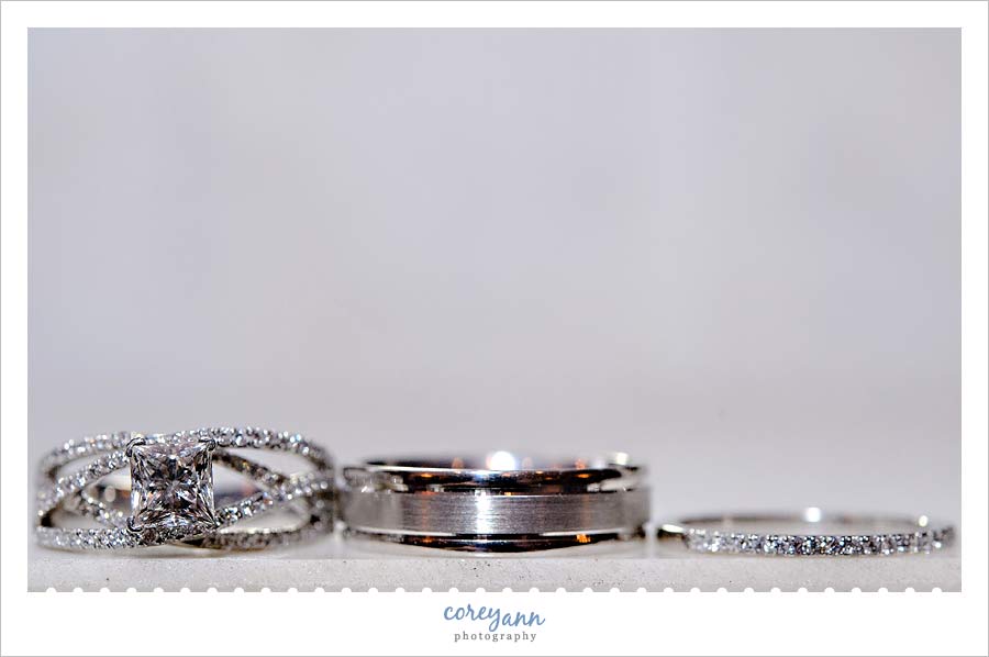 Kathleen and Derek's Canton Wedding wedding rings on white background