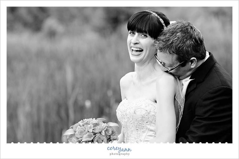 bride and groom laughing during portraits in burton ohio