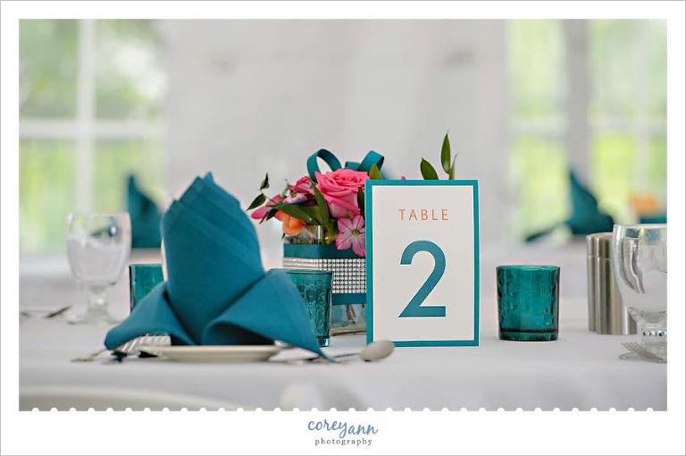 teal and pink wedding reception decor