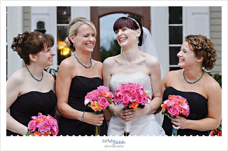 black bridesmaid dresses with pink rose bouquets