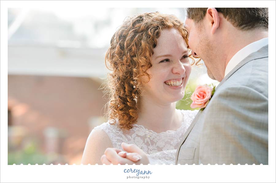 bride and groom sharing a laugh during the first dance
