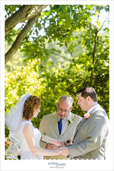wedding ceremony beneath the trees in ohio