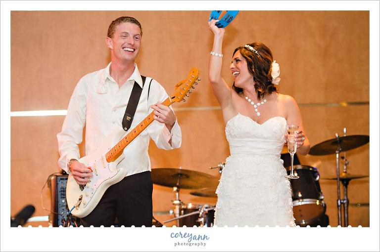 bride and groom playing with the erin rossi band