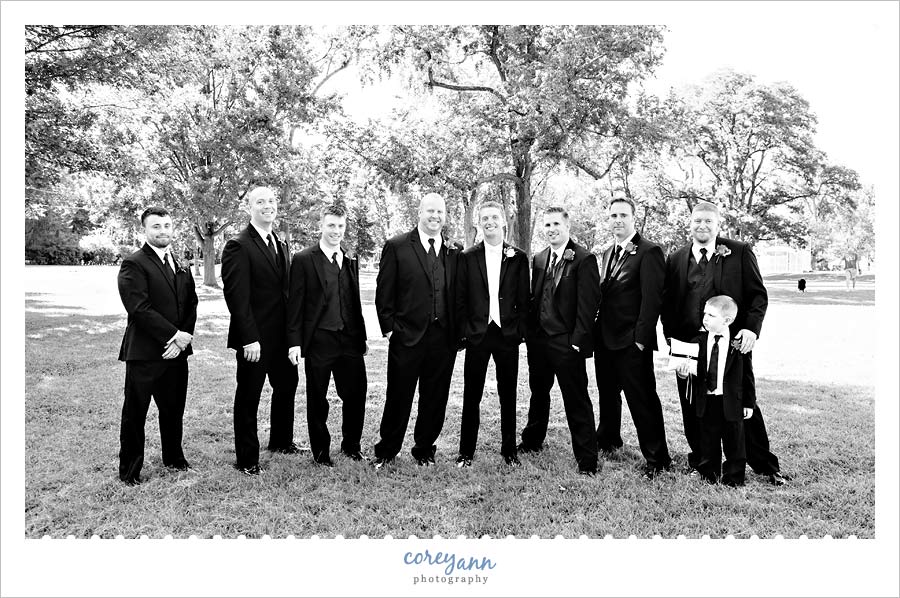 groomsman posing outdoors