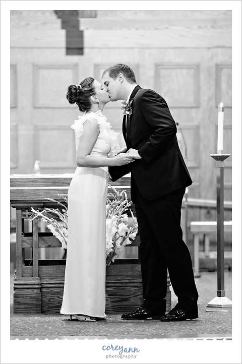 first kiss during wedding ceremony at st paul catholic church