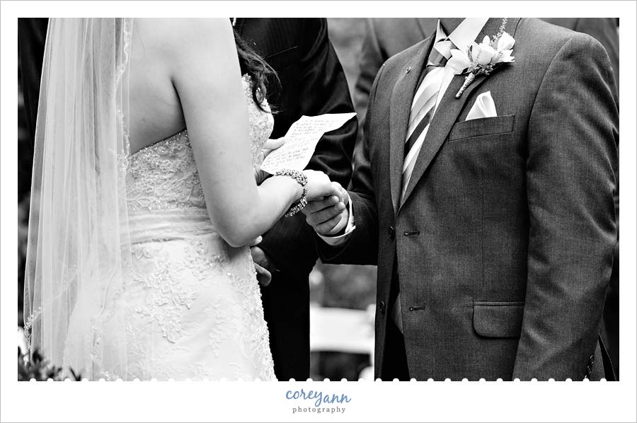 bride reading vows to groom 