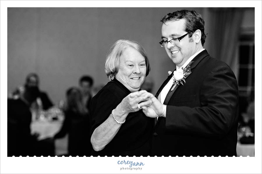 grooms mother checking out ring during dance