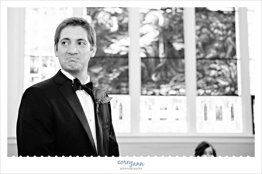 groom getting emotional when seeing bride walk down the aisle