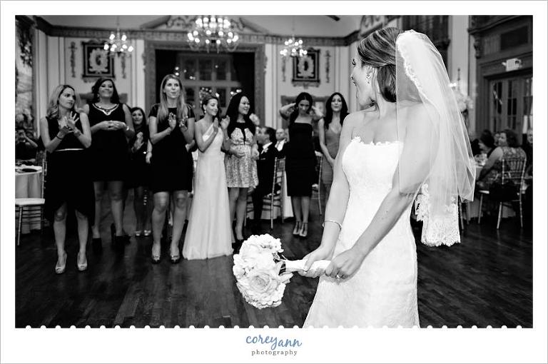 bride tossing her bouquet