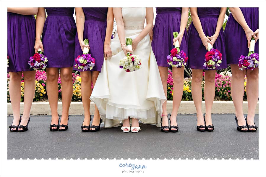 purple bridesmaid dresses with purple and green bouquets