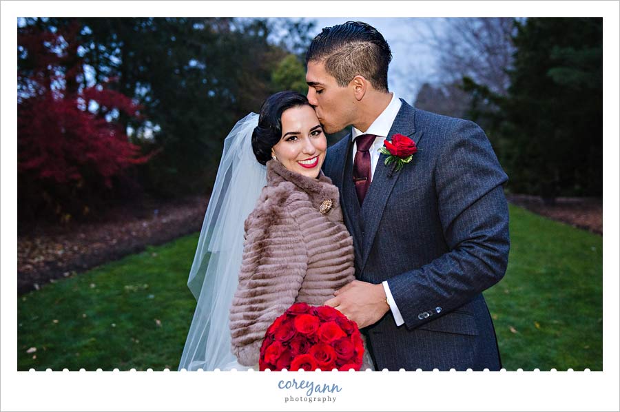 bride wearing fur wrap during wedding in november in ohio
