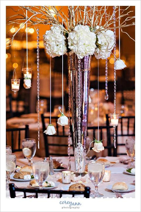 tall hydrangea and branch wedding centerpiece with crystals and roses