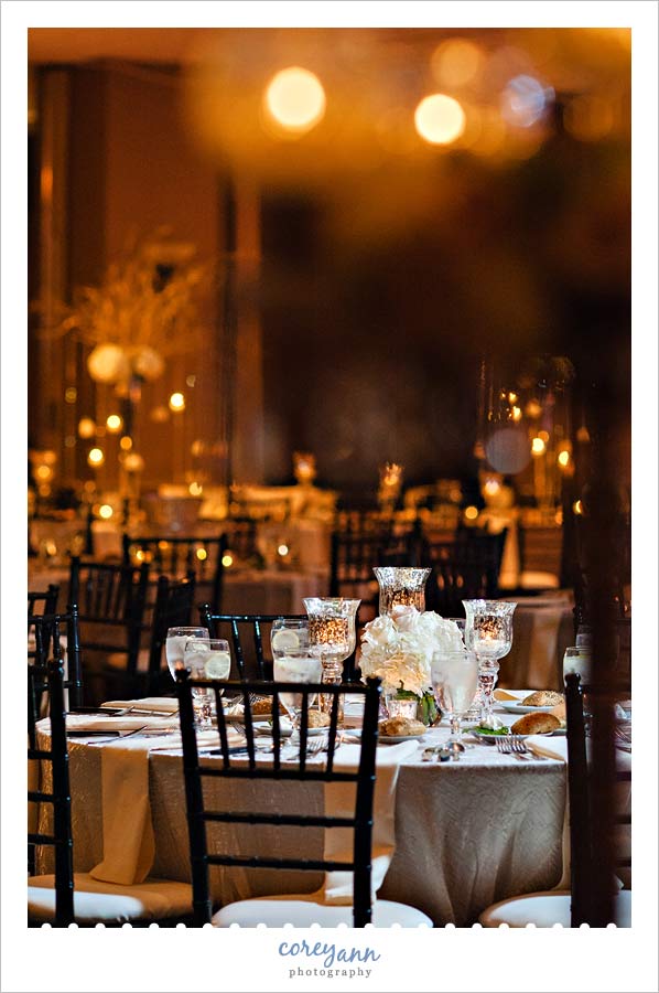 short mercury glass centerpiece at wedding reception