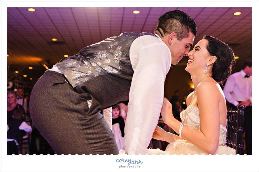removing the garter during the wedding reception