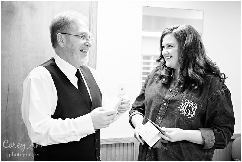 bride giving father bracelet before wedding in ohio