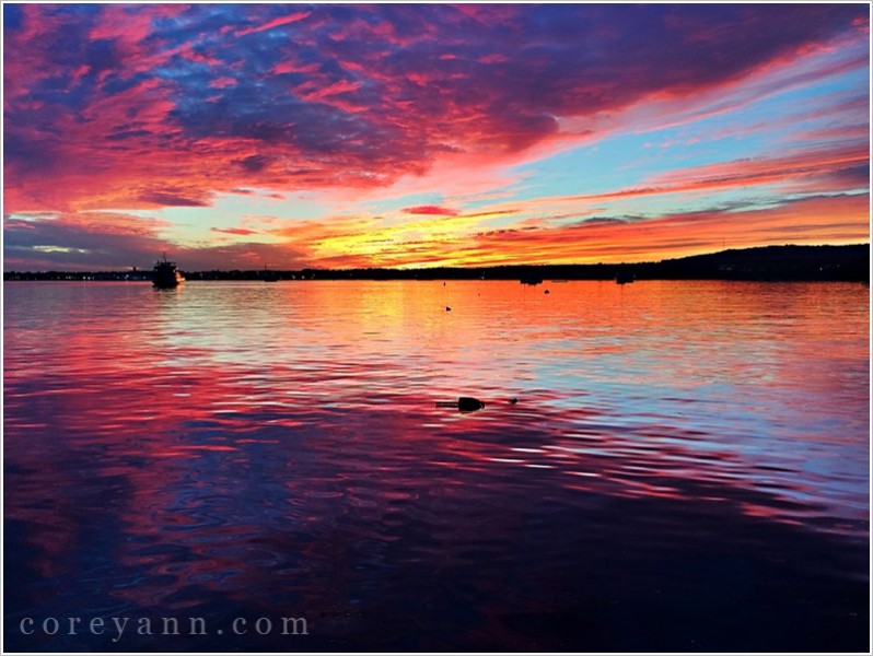 sunset seen from rockland breakwater light in maine