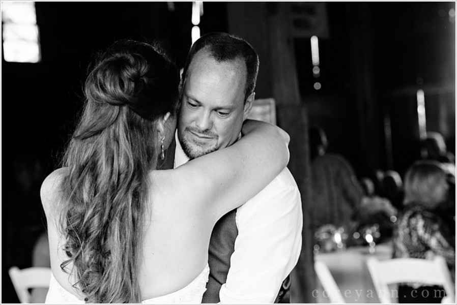 first dance at wedding reception at bride with long veil at conrad botzum farm