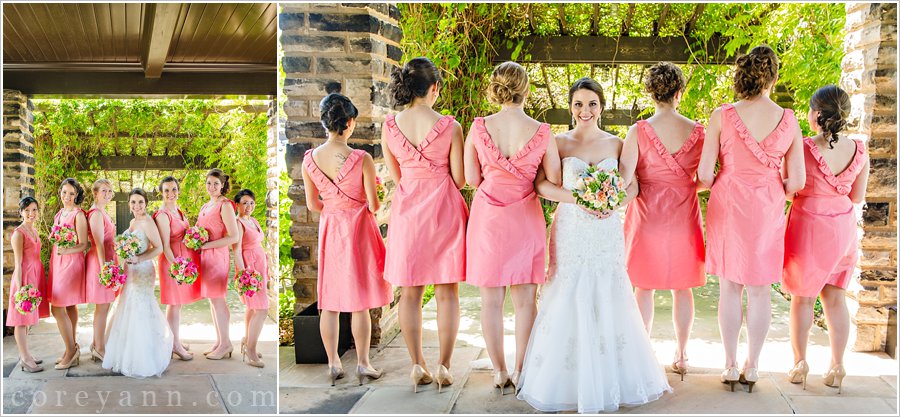 bridesmaids in coral pink dresses