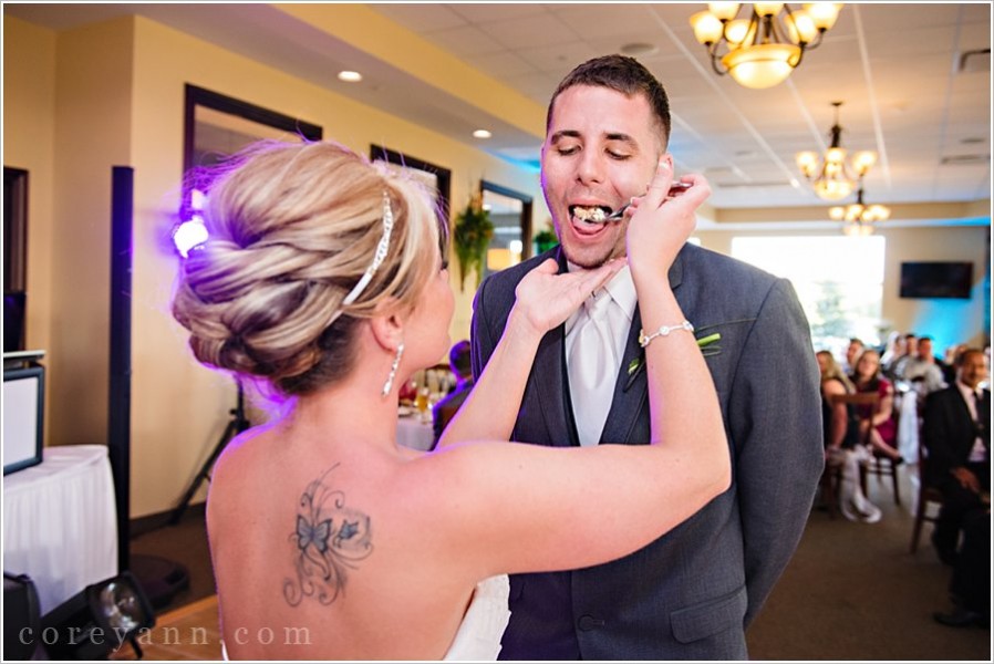 cake cutting at wedding reception at shale creek golf club