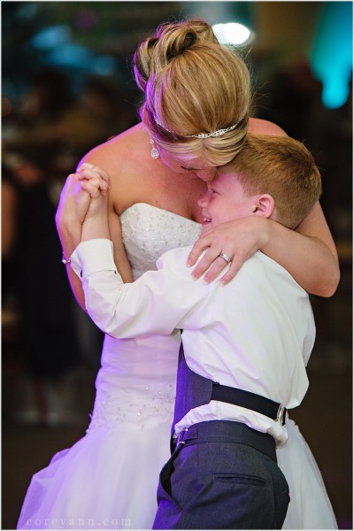bride dancing with her son at the wedding reception