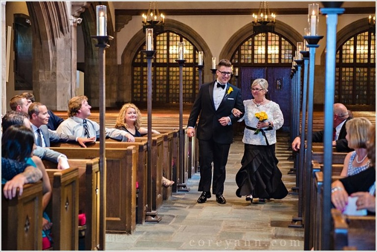 groom and mother walking down aisle at first congregational church in ohio