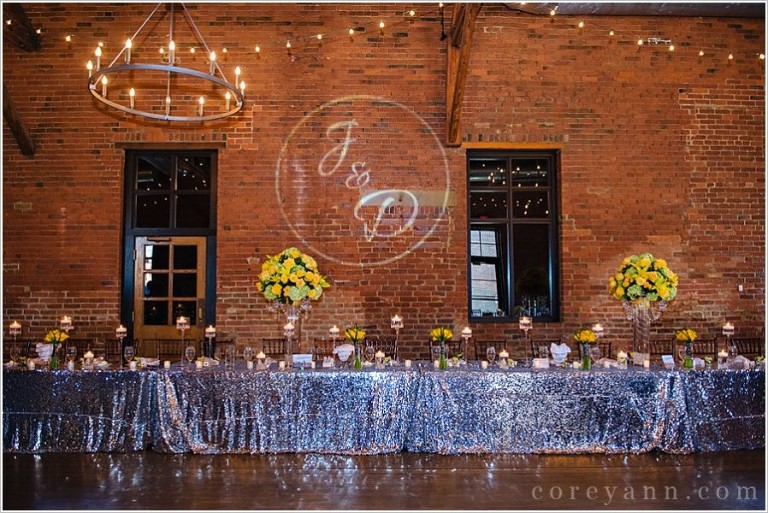 head table at wedding reception at the high line car house in columbus ohio