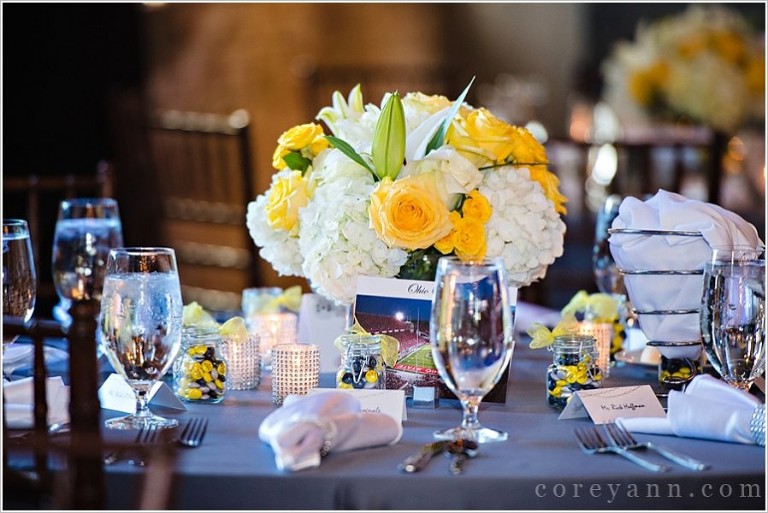 silver and yellow wedding reception tables