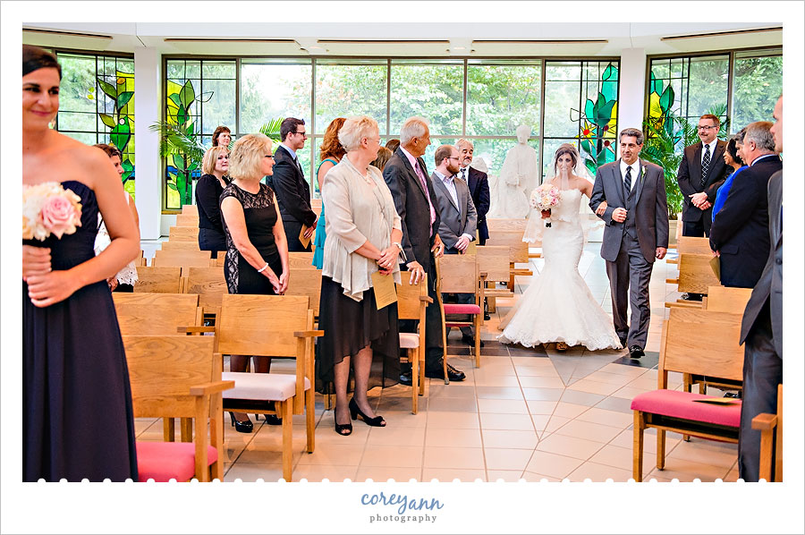 father walking daughter down the aisle at blessed sacrament parish in warren ohio
