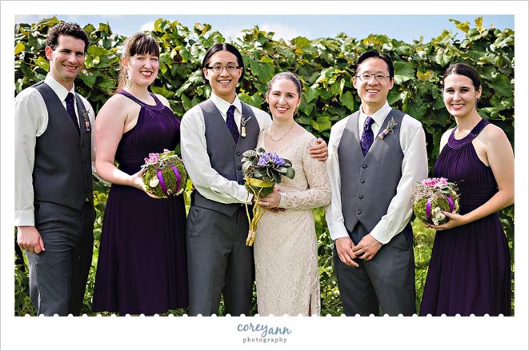 purple and grey bridal party portrait