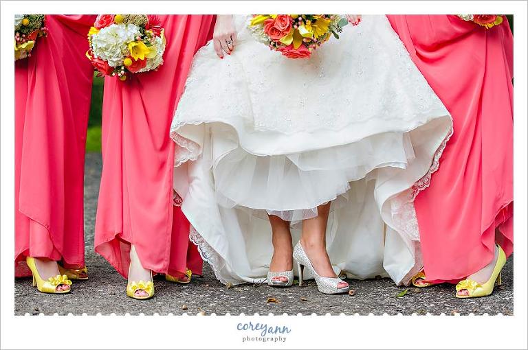 bridesmaids with long pink dresses and yellow shoes