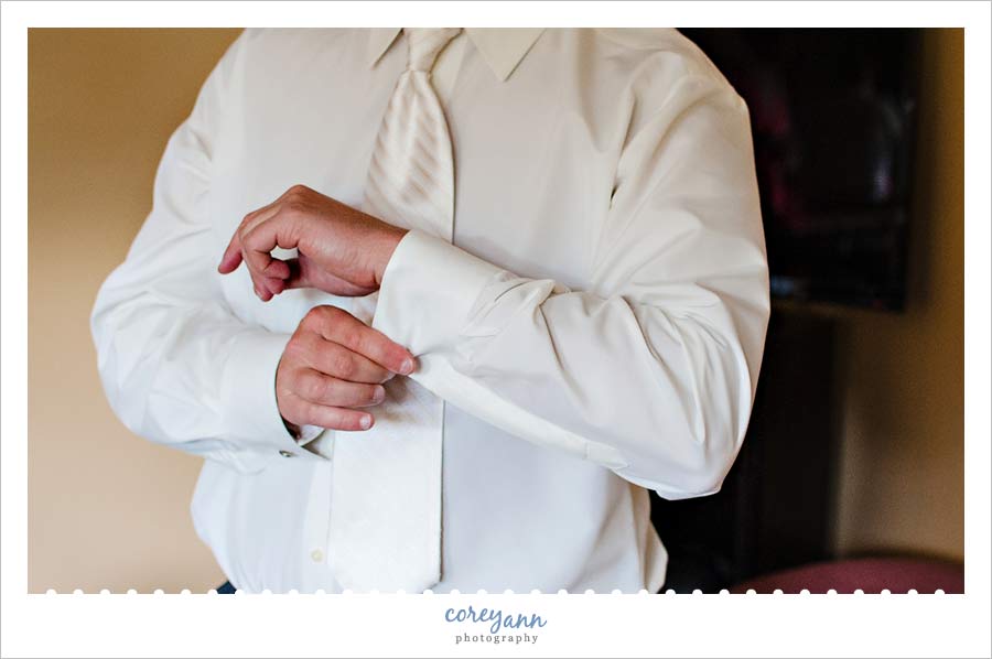 groom getting ready for wedding at bath chuch