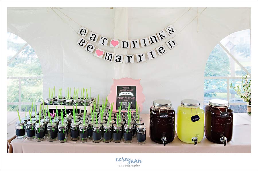 drink station with chalkboard glasses at wedding reception
