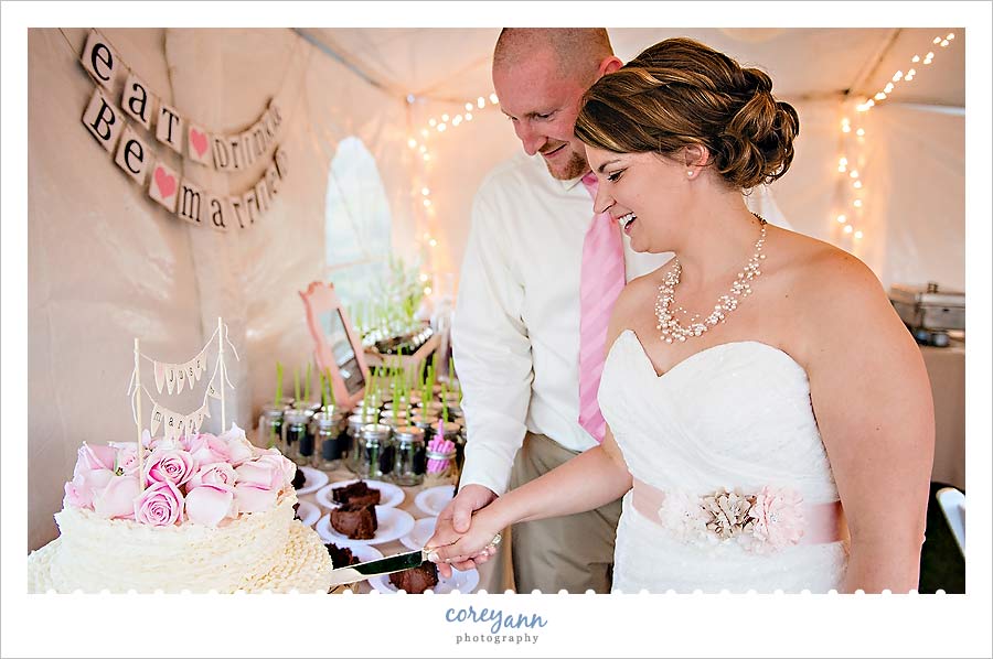 cutting the cake during wedding reception
