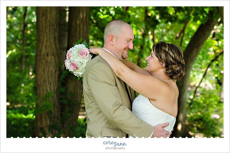 wedding portrait in shaded spot at reservoir park in massillon