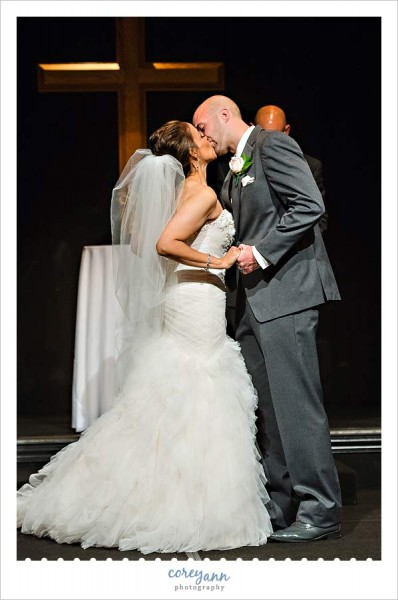 first kiss after wedding ceremony at cuyahoga valley church in ohio