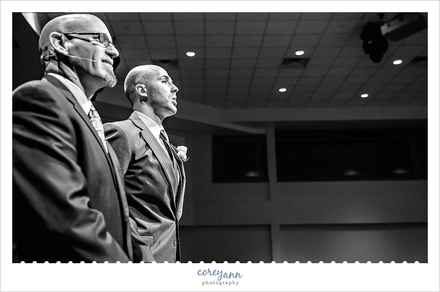 groom's reaction to seeing bride walking down the aisle
