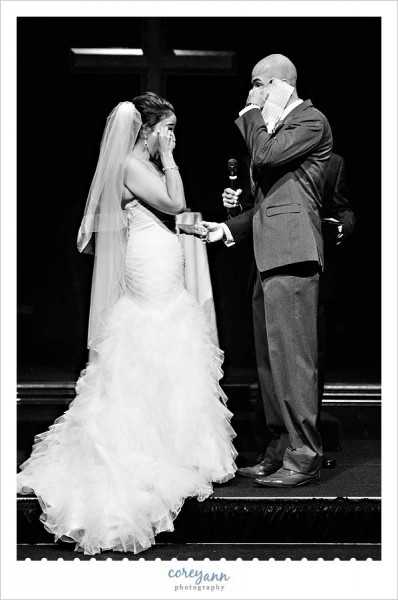 bride and groom crying during wedding ceremony
