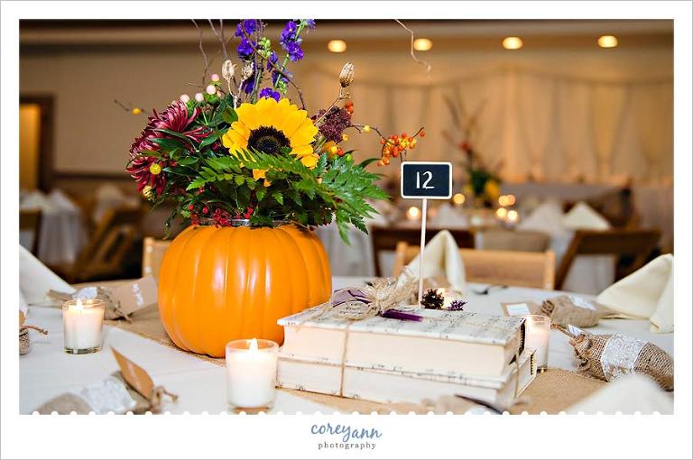 pumpkin centerpieces at wedding in october