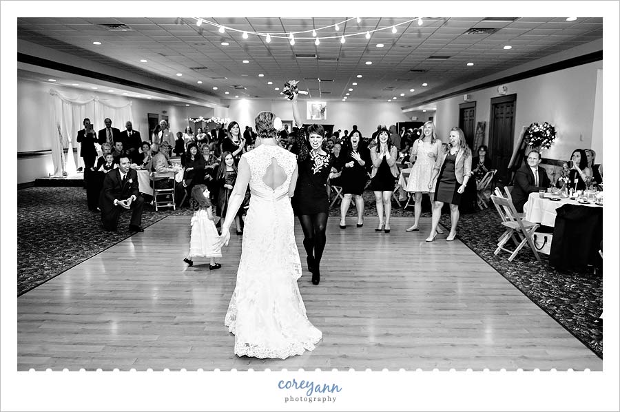 bouquet catch during wedding reception