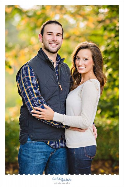 autumn leaves in engagement session