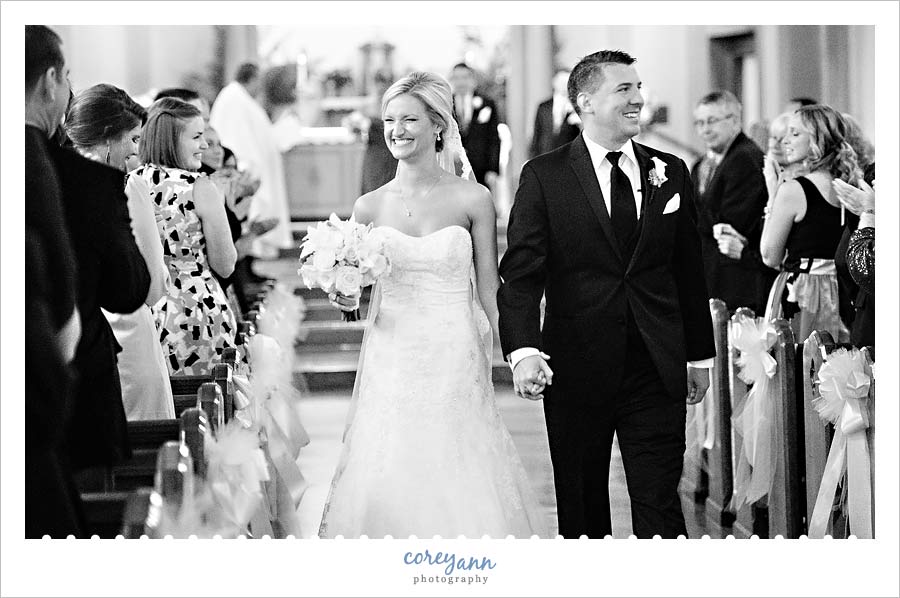 happy couple exiting wedding ceremony in rocky river ohio