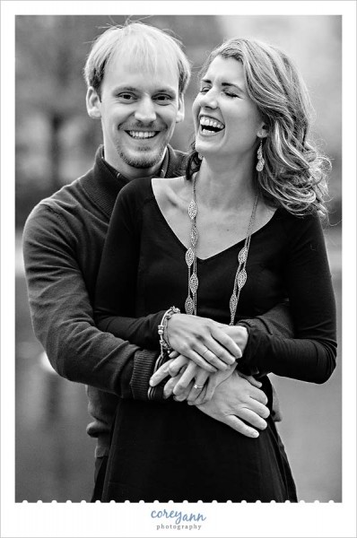 couple laughing during engagement session in ohio
