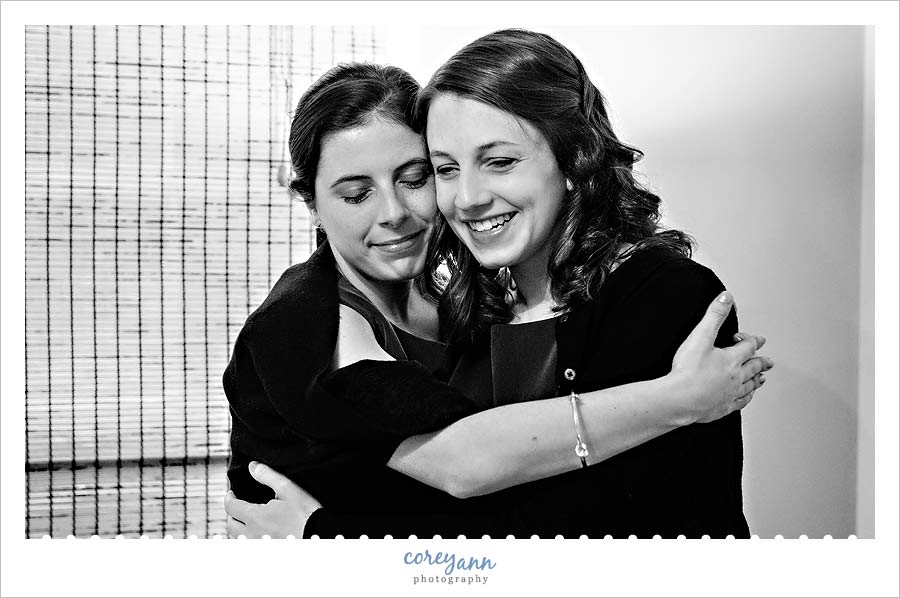 bridesmaids crying after seeing bride in dress