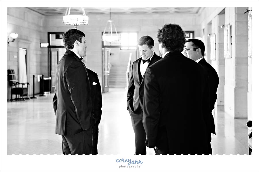 groom and groomsman before wedding  at stambaugh auditorium 