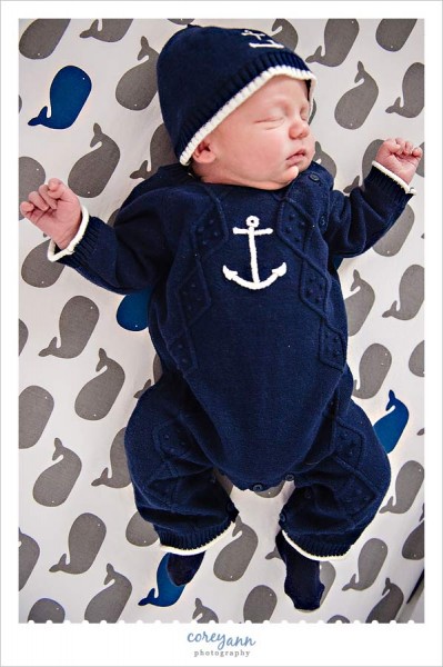 newborn baby boy in nautical outfit
