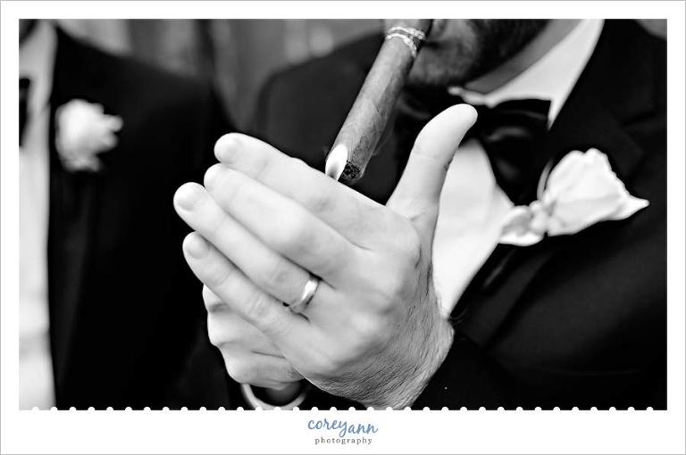 groom lighting cigar 