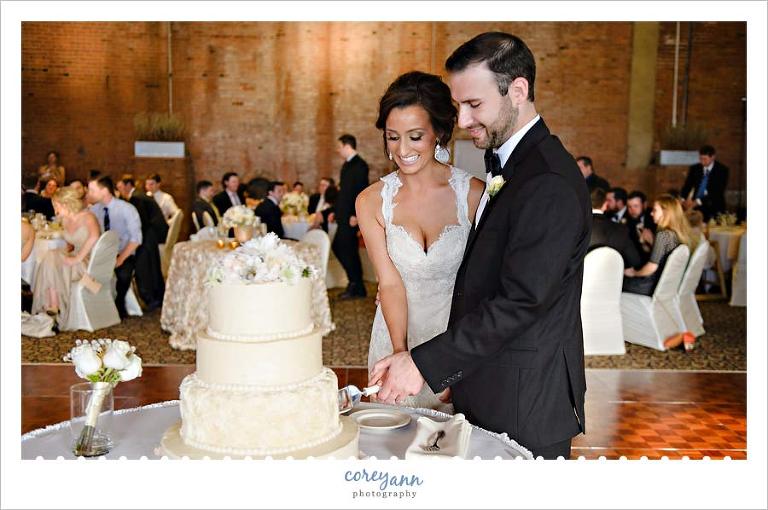 cutting the cake at wedding reception in cleveland