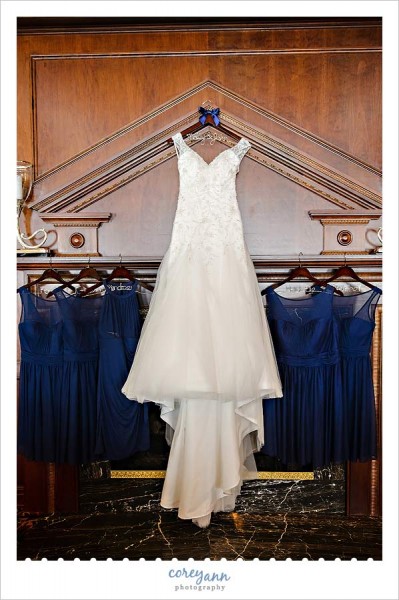wedding and bridesmaid dresses hanging 