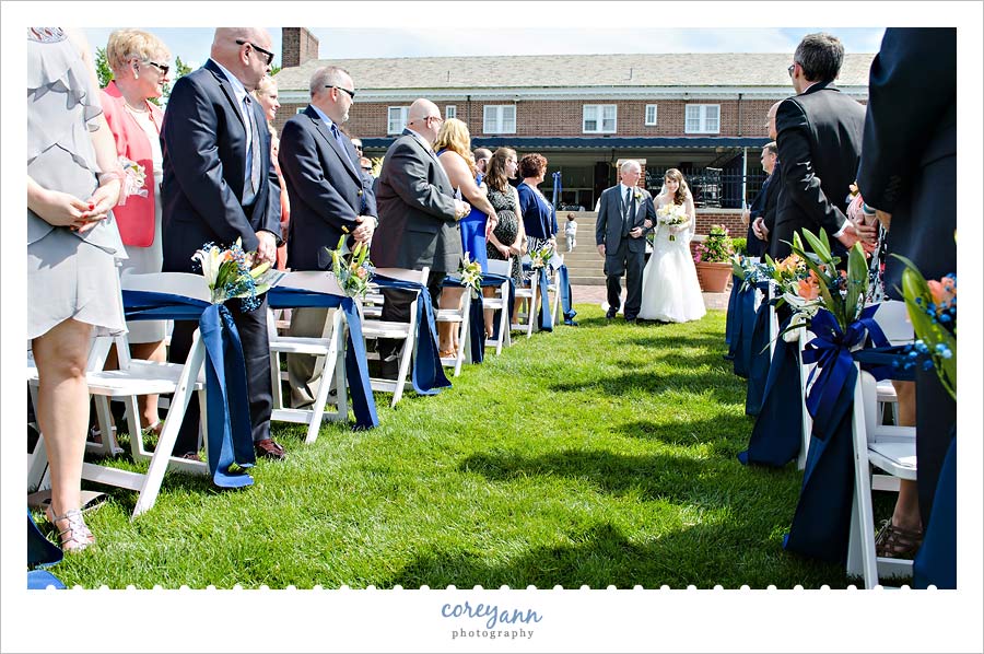 bride walking down the aisle with father in canton ohio